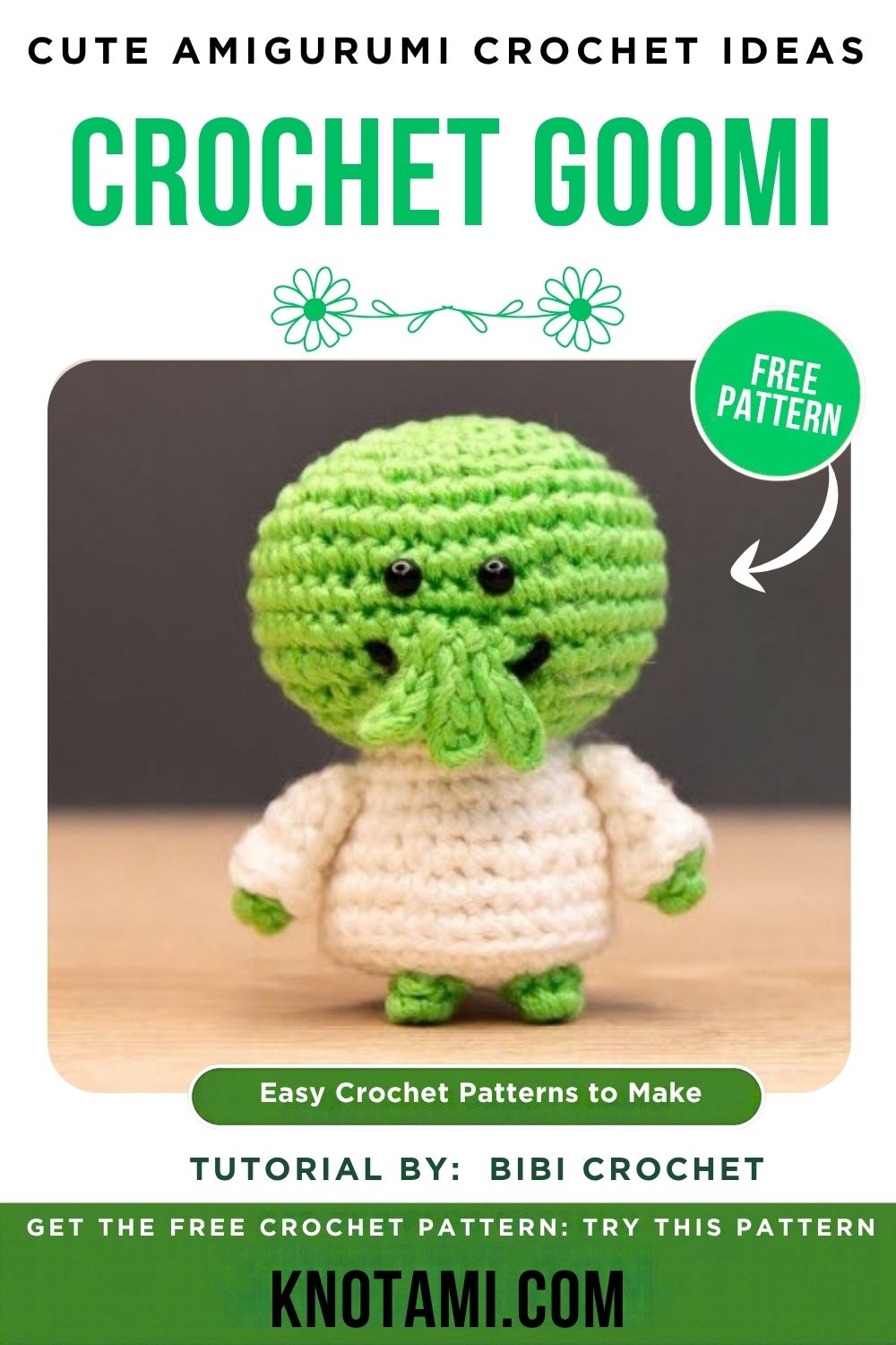 Finished crochet Goomi amigurumi sitting on a desk