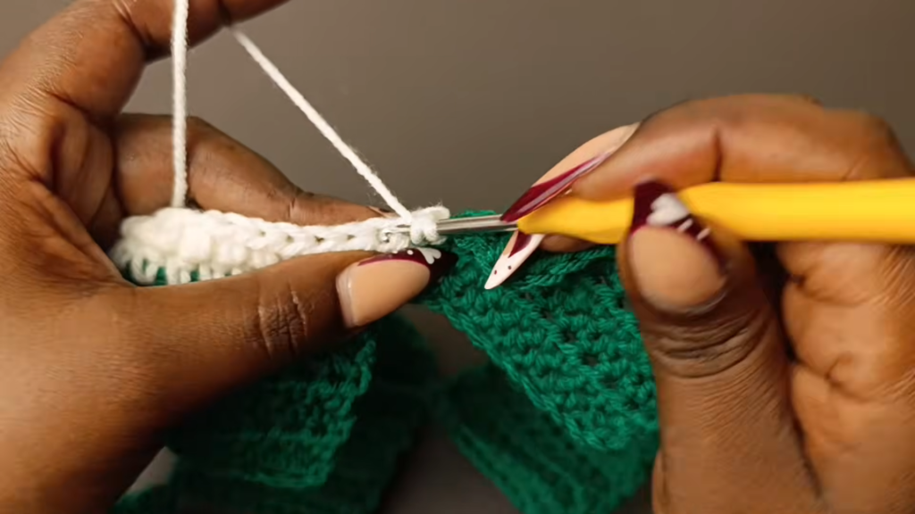 Green base blocks crocheted along the strip