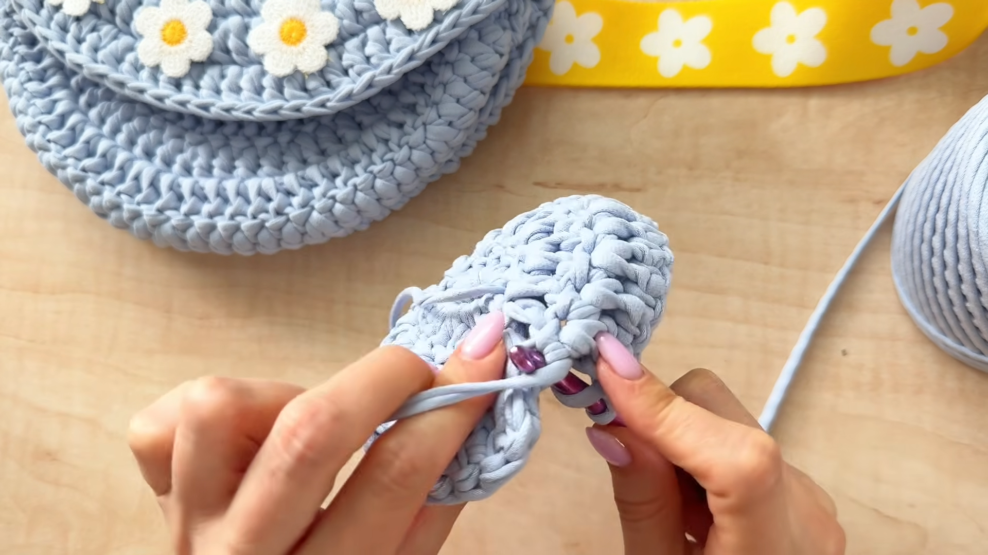 Growing the light blue walls with steady single crochet rounds