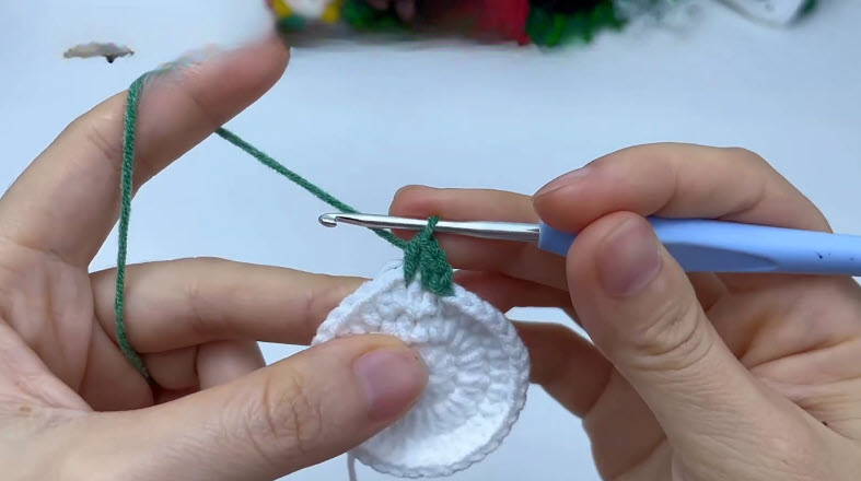 Green yarn joined to shape the square corners.
