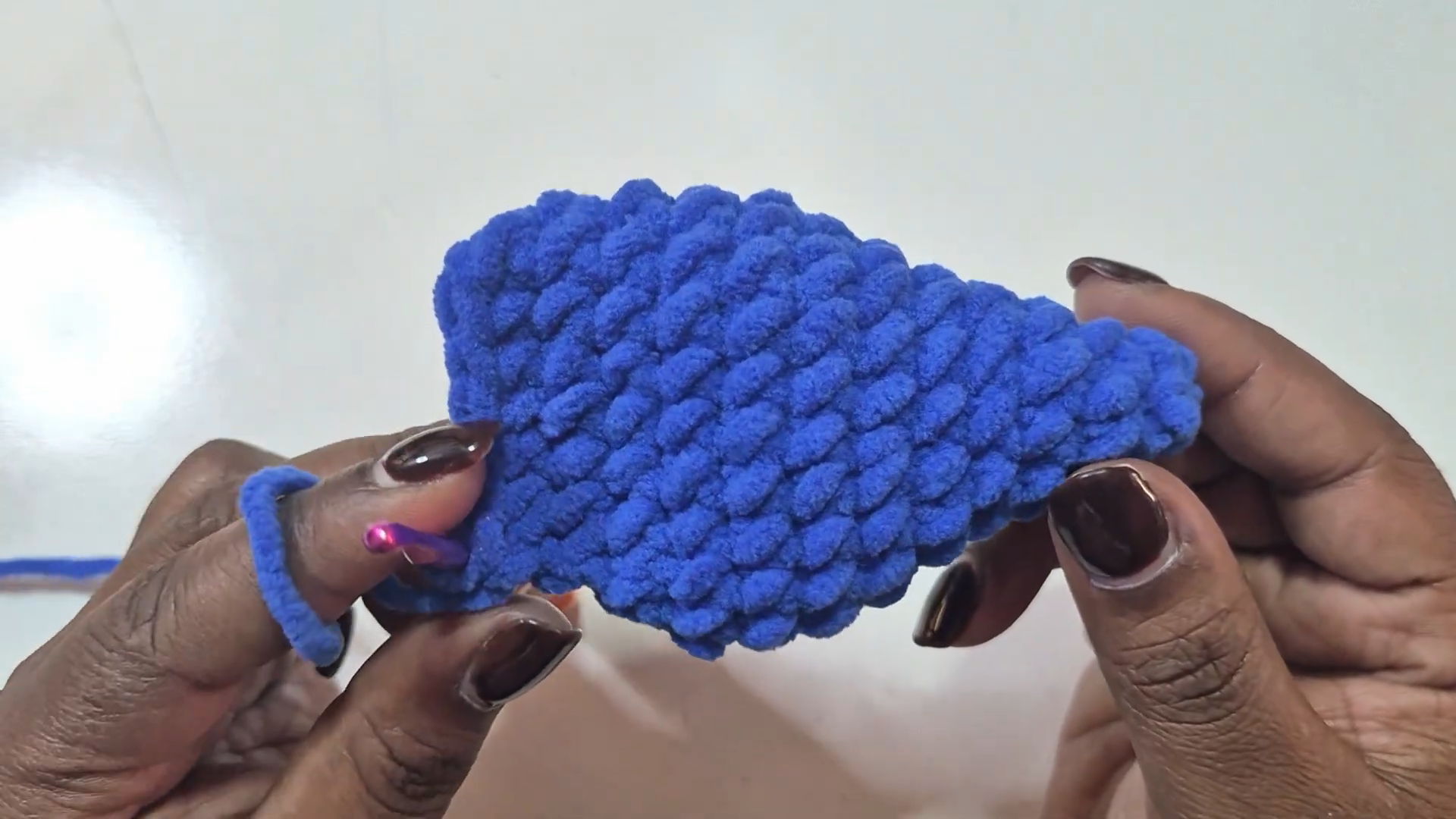 Flat blue crochet goblin ear piece