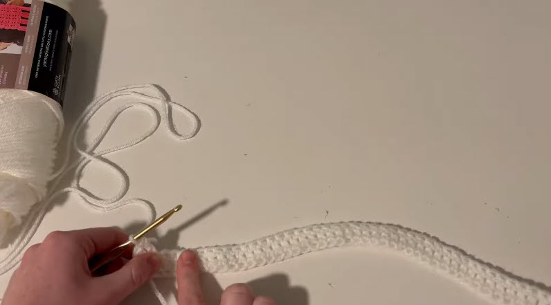 Working the first row into the white chain.